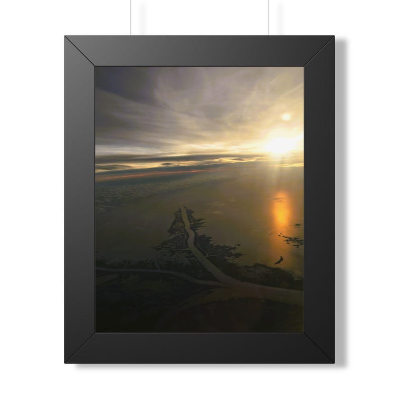 Etsy listing mockup: Warm sunset reflected across the Mississippi River Delta in a black frame